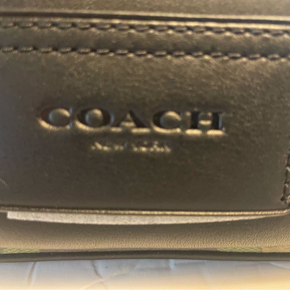 Charcoal color Coach belt bag New with tags.